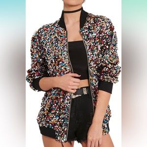 Multi-color sequin jacket with black trim. New with tags.